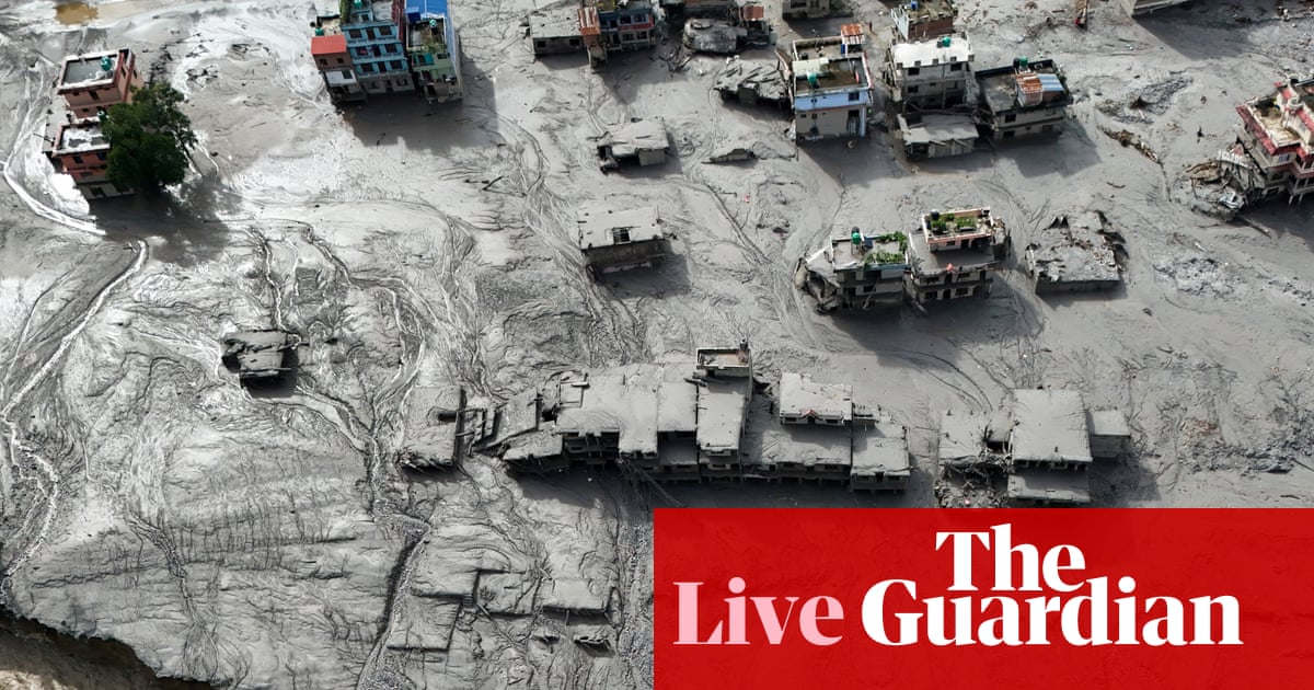 Nepal flash flood: death toll nears 400 amid warning of fresh danger from rising lake water – latest updates